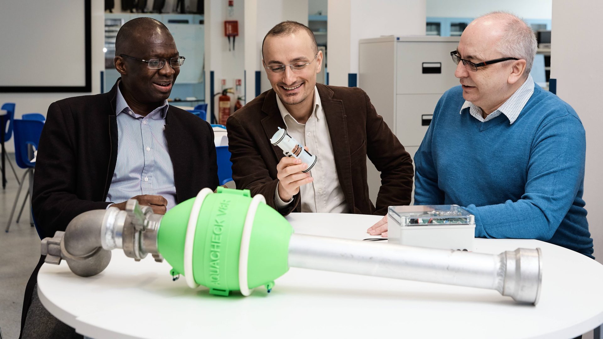 Dr Dario Chiantello (centre) and supervisor Professor Bamidele Adebisi (l) with Paul Carrington, managing director of Aquacheck Engineering, during development of the Smart Standpipe technology.