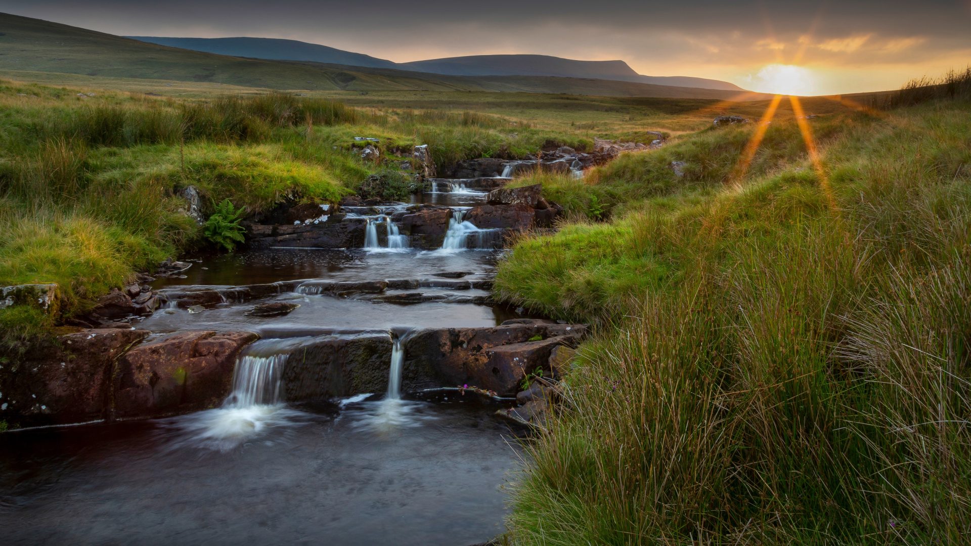 Sunset near the source of the river Tawe in the Brecon Beacons, South Wales, UK