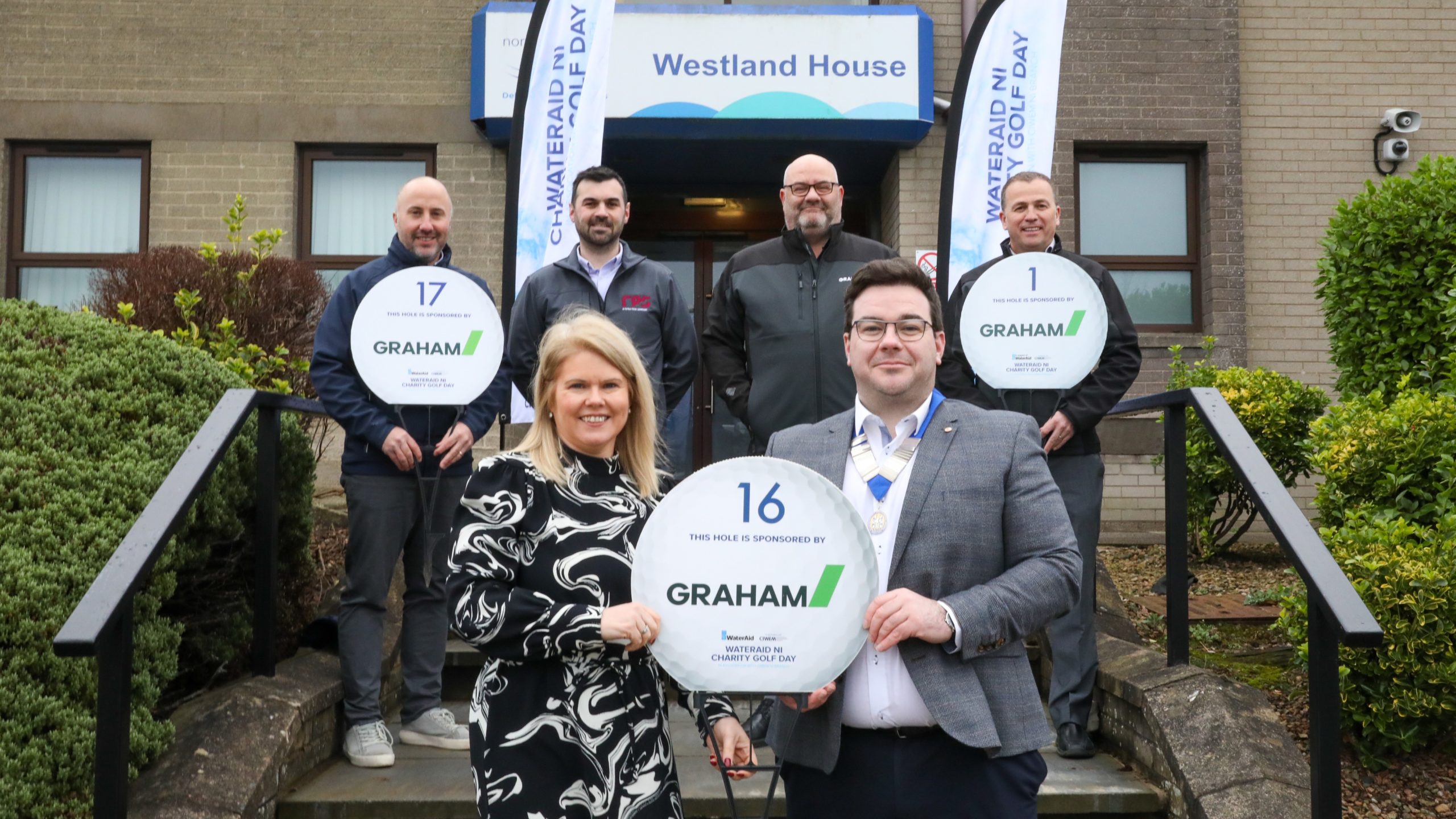Colin McKeever and Gareth Smyth from GRAHAM (back right), joined Mark McEvoy, RPS and Michael Donnelly, NI Water – part of the event organising committee – and Paul Rocks, Chair of CIWEM NI Branch present Dr Sara Venning WaterAid NI President & CEO of NI Water with the £15,000 raised through the 2024 charity golf event.