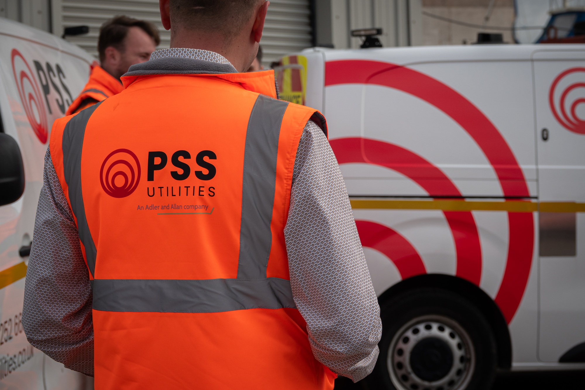 PSS Utilities staff member wearing new branded PPE